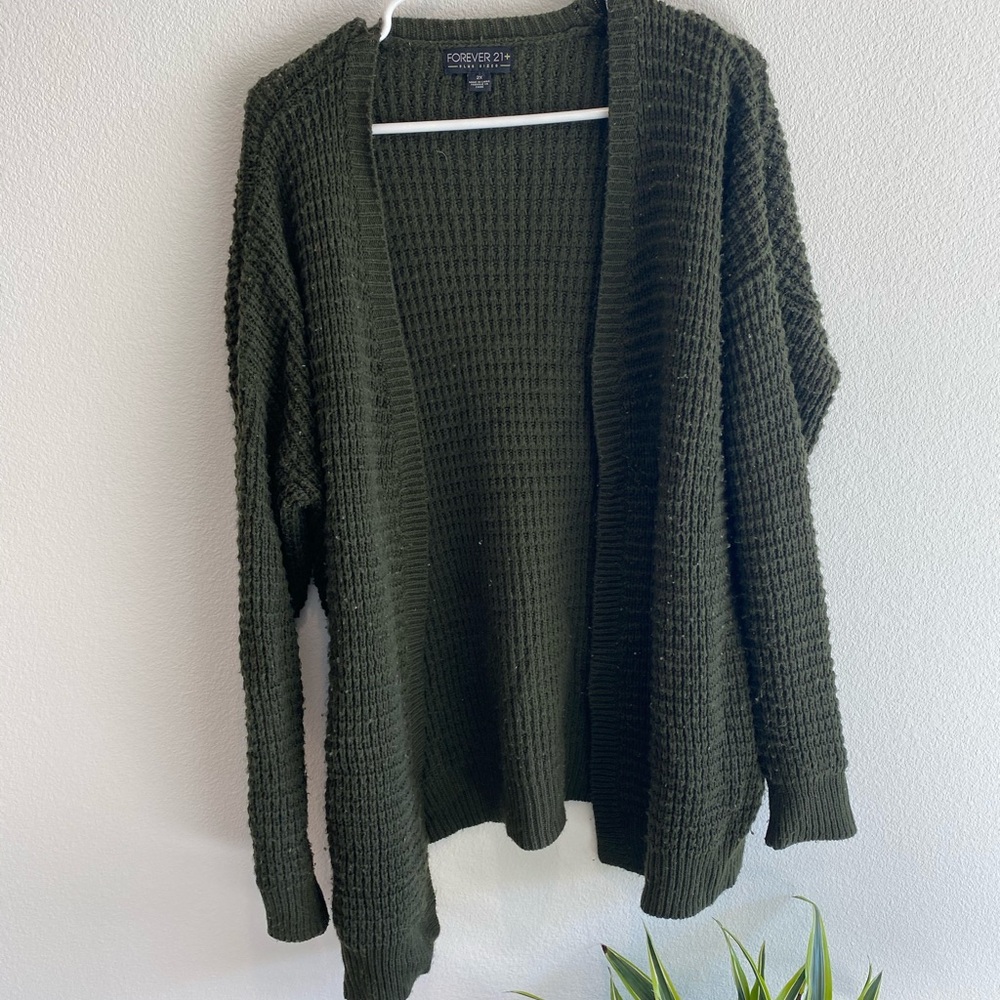 Green cardigan sweater